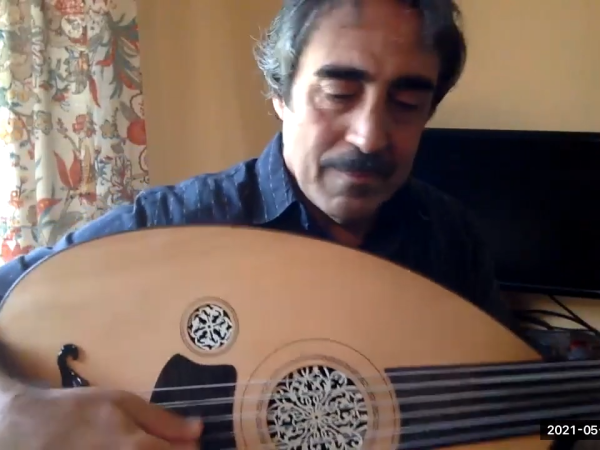 Simon with oud donate
